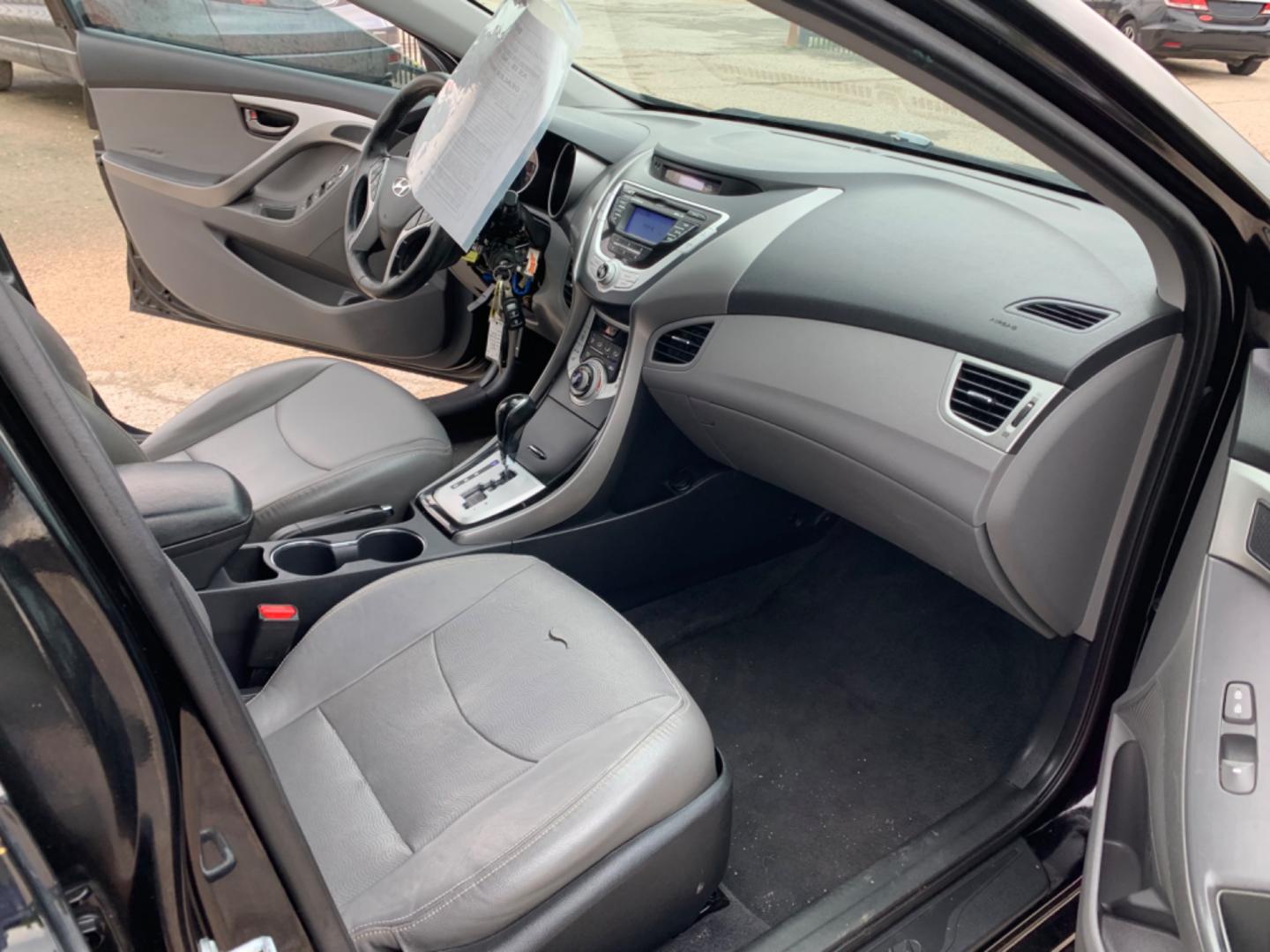 2012 Black Hyundai Elantra GLS A/T (KMHDH4AE3CU) with an 1.8L L4 DOHC 16V engine, Automatic transmission, located at 1830 North Belt Line Road, Irving, TX, 75061, (469) 524-0199, 32.834373, -96.993584 - Photo#10